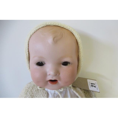 21 - A Baby Gloria bisque flange neck doll, with brown sleeping eyes, open mouth, two top teeth, fabric b... 