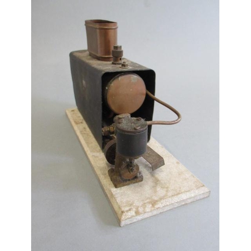 238 - Small Marine type spirit fired engine with single oscillating cylinder on wooden base, F (Est. plus ... 