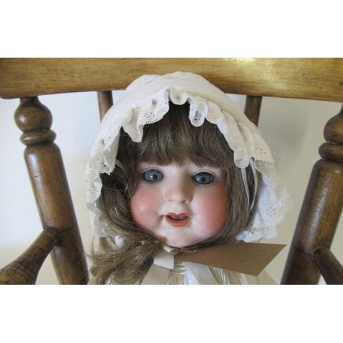 26 - An Armand Marseille bisque socket head character doll, with blue glass sleeping eyes, open mouth, te... 