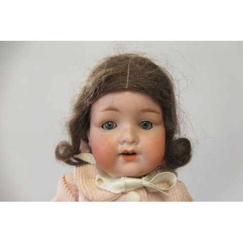 34 - Two Armand Marseille bisque socket head dolls, comprising one 9 1/2