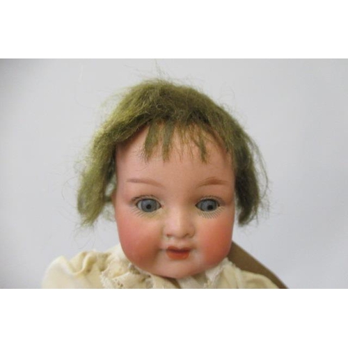 34 - Two Armand Marseille bisque socket head dolls, comprising one 9 1/2