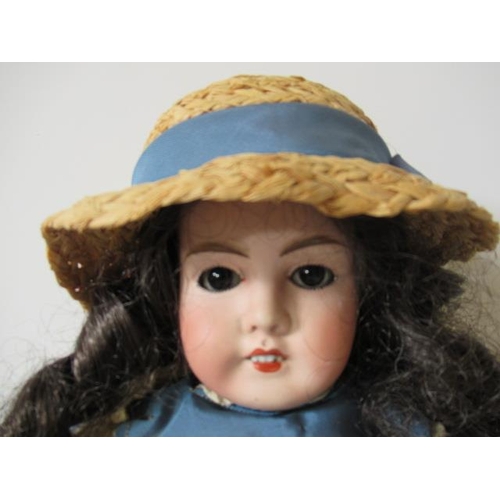 35 - A Limoges France bisque socket head doll, with brown glass sleeping eyes, open mouth and teeth, pier... 