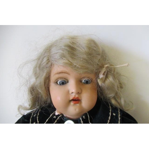 54 - A Kammer & Reinhardt celluloid socket head doll, with blue glass sleeping eyes, open mouth, teeth, j... 