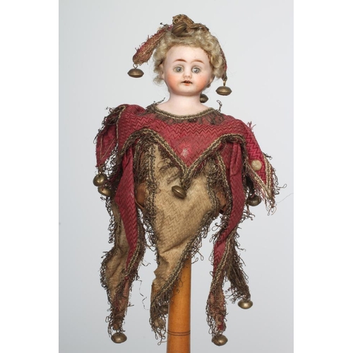 6 - A bisque shoulder head musical marotte doll, by Heinrich Handwerck, with blue glass fixed eyes, open... 