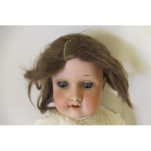 78 - An Armand Marseille bisque shoulder head doll, with blue glass sleeping eyes, open mouth, teeth, joi... 