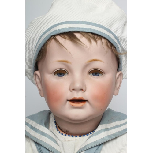 106 - A J D Kestner bisque socket head character sailor boy, with blue glass sleeping eyes, open mouth and... 