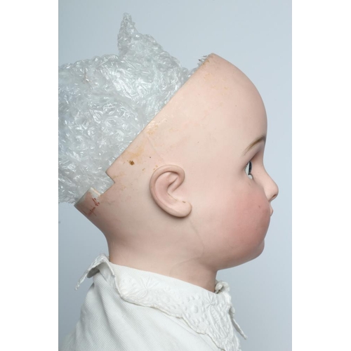 125 - A large Jules Nicholas Steiner bisque socket head doll, with closed mouth and pierced ears, blue gla... 