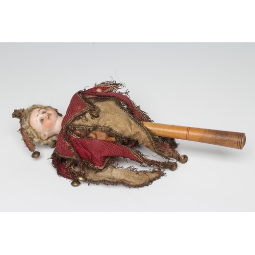 6 - A bisque shoulder head musical marotte doll, by Heinrich Handwerck, with blue glass fixed eyes, open... 