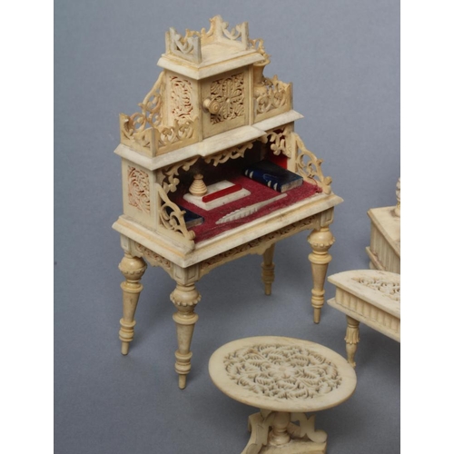 81 - A collection of Victorian bone and ivory doll's house furniture, all with pierced design comprising ... 