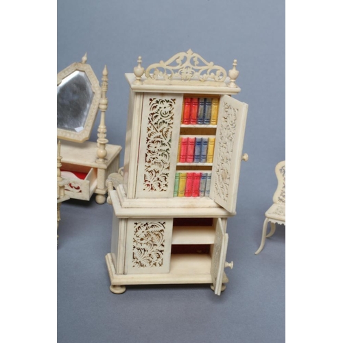 81 - A collection of Victorian bone and ivory doll's house furniture, all with pierced design comprising ... 