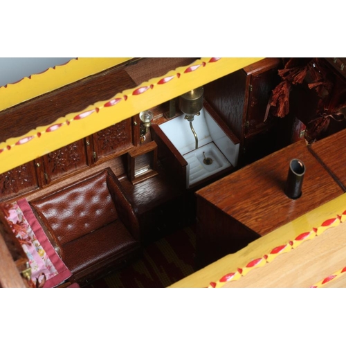 909 - A well made model of a horse drawn gypsy caravan, wood construction, fine decoration with detailed i... 