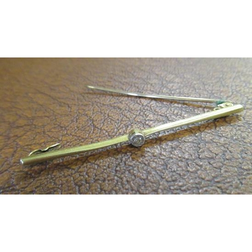 212 - 15CT GOLD AND DIAMOND TIE PIN