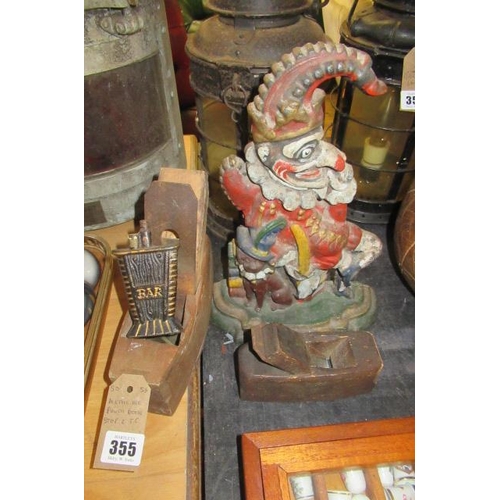 355 - CAST IRON MR PUNCH DOOR STOP ETC