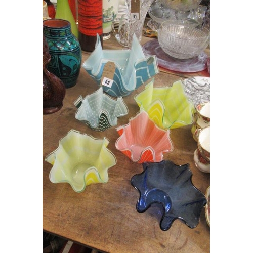 63 - SIX COLOURED GLASS HANDKERCHIEF VASES