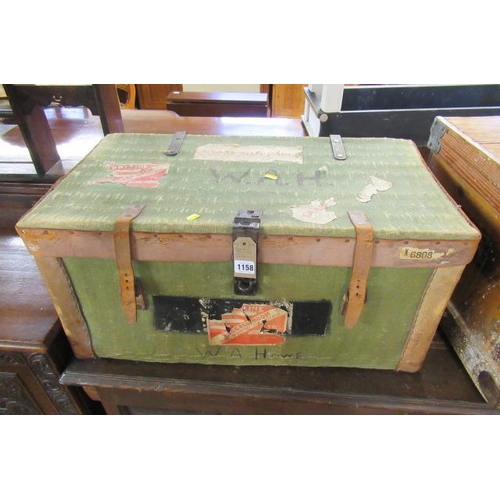 1158 - GREEN CANVAS AND LEATHER TRUNK WITH LABELS