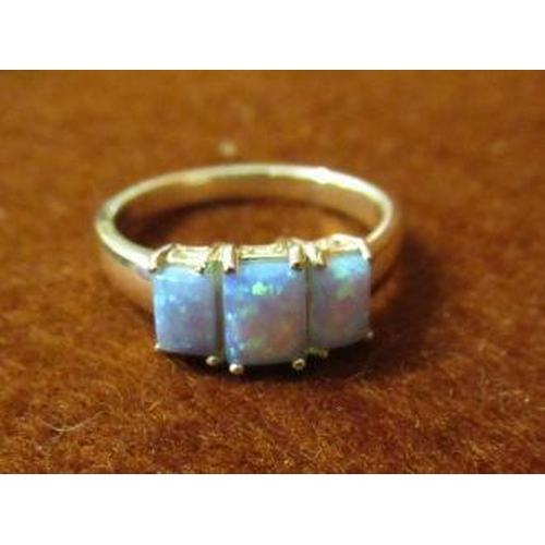 204 - WHITE METAL AND BLUE OPAL SET RING