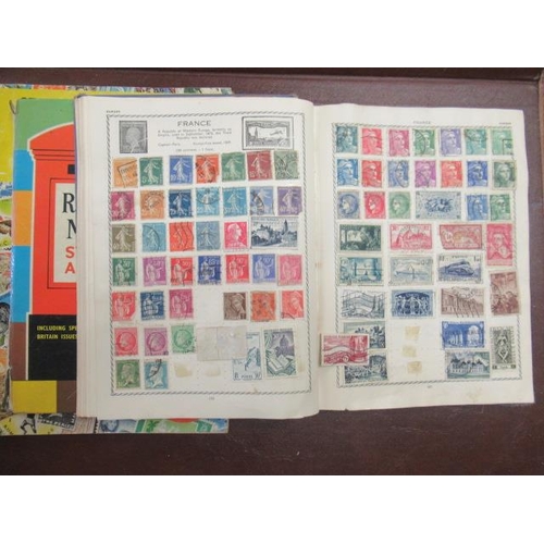 676 - THREE ALBUMS OF STAMPS