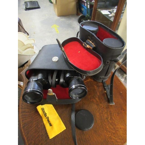 22 - TWO PAIRS OF CASED BINOCULARS