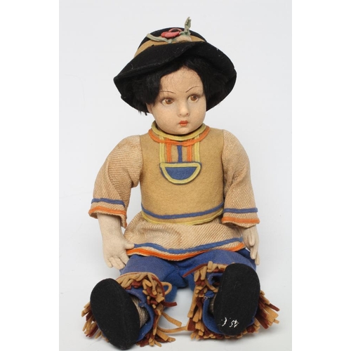 10 - A pre-war Lenci boy doll, with felt head and arms, painted features, jointed body and original outfi... 