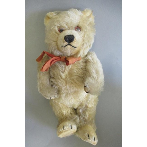 117 - Three vintage bears, comprising a 12