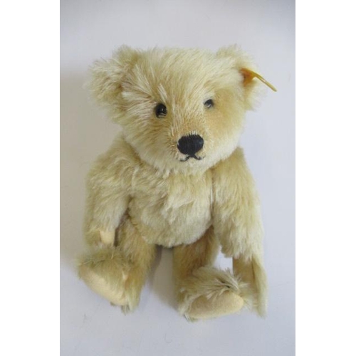 149 - Two Steiff teddy bears, one with light orange plush, ear button and label, the other with darker plu... 