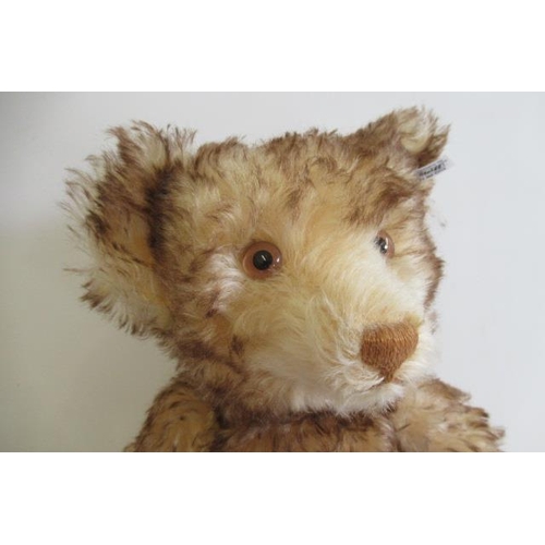 160 - A boxed Steiff replica 1926 teddy, with bi-colour plush, ear button and tag, card label, certificate... 