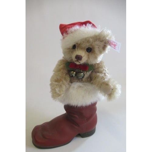 170 - Four Christmas Steiff bears, comprising a boxed Father Christmas with Pony Sledge, a boxed teddy bea... 