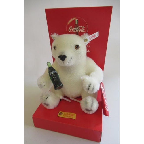 172 - Three Steiff Coca-Cola edition bears, comprising a boxed Polar Bear Cub, a boxed Santa and a Polar B... 