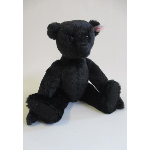 176 - Two boxed Steiff items, comprising a 35cm black bear and a Donkey