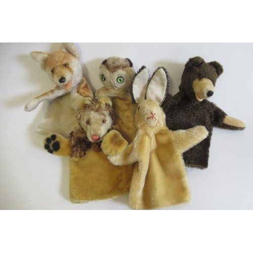 177 - Five vintage plush puppets, possibly Steiff, comprising a lion, an owl, a rabbit, a fox and a bear