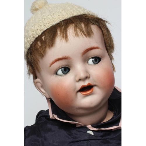 22 - A Kammer & Reinhardt bisque socket head character doll, with blue glass flirty eyes, sleeping eyelid... 