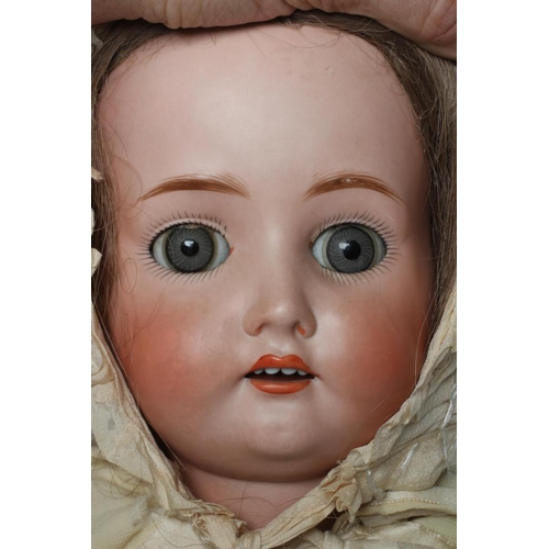 24 - A J D Kestner bisque socket head doll, with blue glass paperweight sleeping eyes, open mouth, applie... 