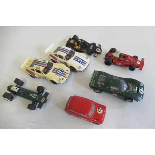 278 - Seven playworn Scalextric racing cars including Porsche and Ford, some damage, F-P