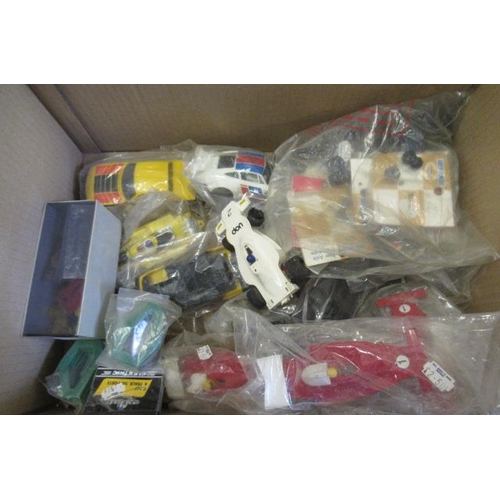 280 - Scalextric spare parts including car bodies, gears and pickups, F