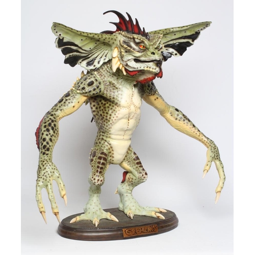 293 - A large model of Gremlins Mohawk, by Neca, marked in pen underneath 14/80. of painted resin construc... 