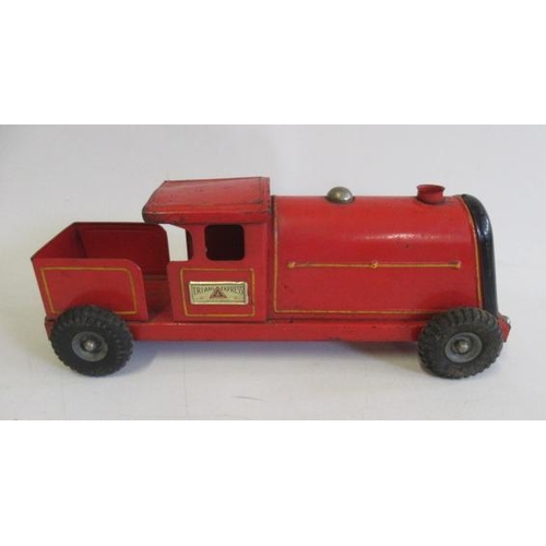 294 - Triang toys push-a-long locomotive finished in red with rubber wheels, some rusting, paint damage, F... 