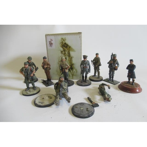 305 - Ten 85mm military figures, some items detached from base, and a boxed historical knight on horseback