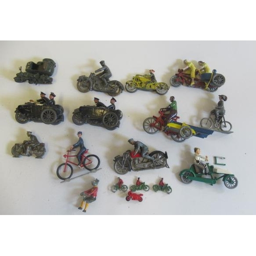 340 - Britains, Morestone and others motorbike and bicycles including police bike and side car and a Mores... 