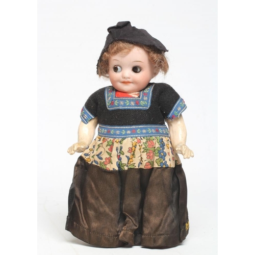 4 - An Armand Marseille googlie eye Dutch girl, with bisque socket head, brown glass sleeping eyes, clos... 