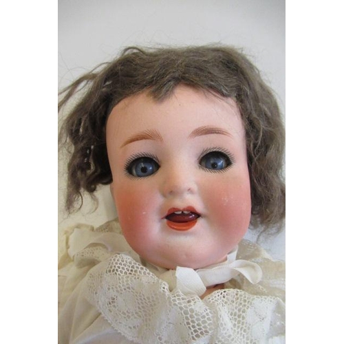 45 - A Heubach Koppelsdorf bisque socket head character doll, with blue glass sleeping eyes, open mouth, ... 