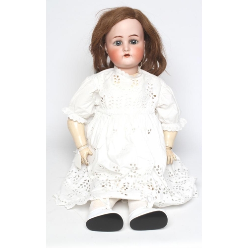 5 - A Kammer & Reinhardt bisque socket head doll, with blue glass sleeping eyes, open mouth, moulded eye... 