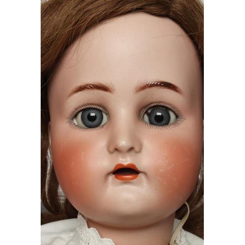 5 - A Kammer & Reinhardt bisque socket head doll, with blue glass sleeping eyes, open mouth, moulded eye... 