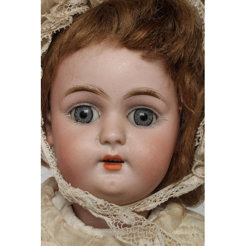 56 - A Simon Halbig bisque socket head doll, with blue glass sleeping eyes, open mouth, teeth, pierced ea... 