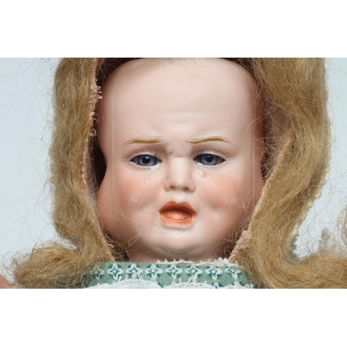 58 - A Carl Bergner three faced bisque head doll, with sleeping, laughing and crying faces, glass fixed e... 