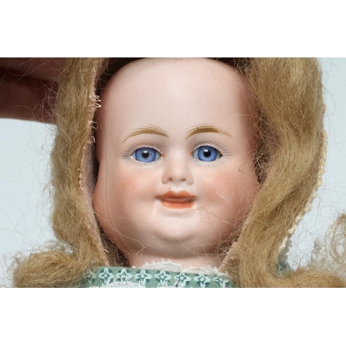 58 - A Carl Bergner three faced bisque head doll, with sleeping, laughing and crying faces, glass fixed e... 