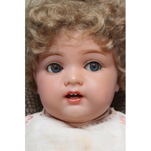 89 - A fantastic condition Kammer & Reinhardt celluloid socket head doll, with blue glass flirty eyes, sl... 