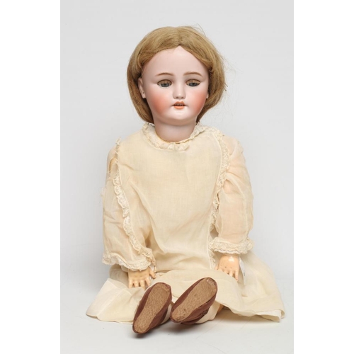 9 - A C. M. Bergmann bisque socket head doll, with blue glass sleeping eyes, open mouth, top teeth, pier... 