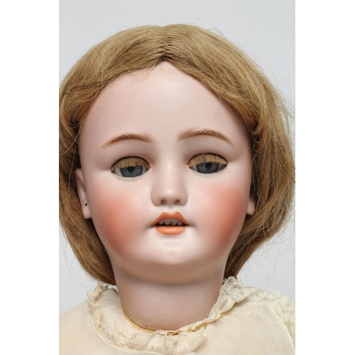 9 - A C. M. Bergmann bisque socket head doll, with blue glass sleeping eyes, open mouth, top teeth, pier... 