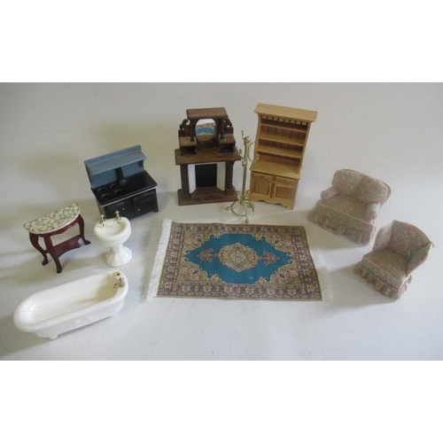 107 - A box of doll's house furniture, including fireplace, dresser, stove/aga, dining table and chairs, t... 