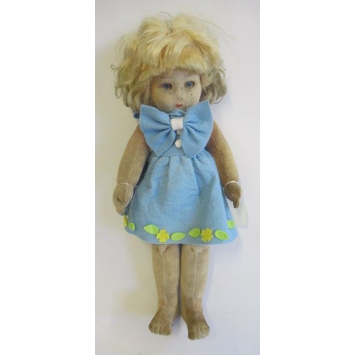 12 - A Chad Valley Bambina doll, felt construction, blue glass fixed eyes, blond wig, jointed body, label... 